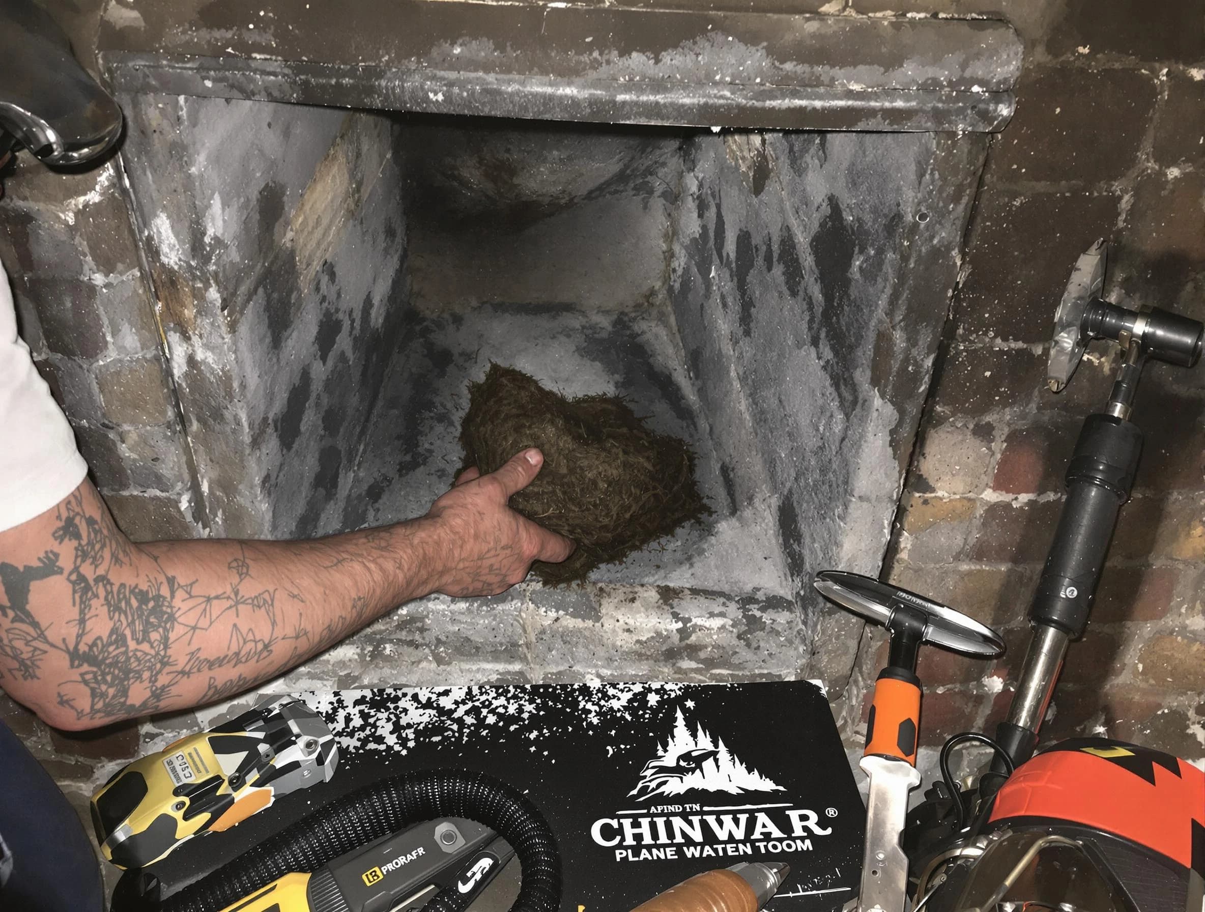 Lyndhurst Chimney Sweep safely removing debris and screening chimney in Lyndhurst, NJ